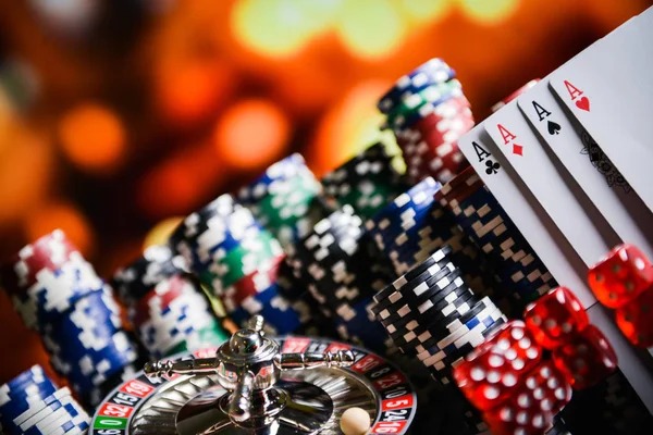 Smartphone screen showing live casino lobby with multiple table options